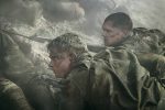 "Two soldiers with dirt-covered faces and clothing lie on the ground in a smoky, chaotic battlefield, looking tense and wary. The environment is gritty and intense, with scattered bodies and debris around them."