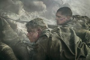 "Two soldiers with dirt-covered faces and clothing lie on the ground in a smoky, chaotic battlefield, looking tense and wary. The environment is gritty and intense, with scattered bodies and debris around them."