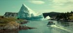 "Fishing boat sailing through a narrow waterway flanked by rocky shores and evergreen trees, with a massive iceberg floating ahead, under a partly cloudy sky."